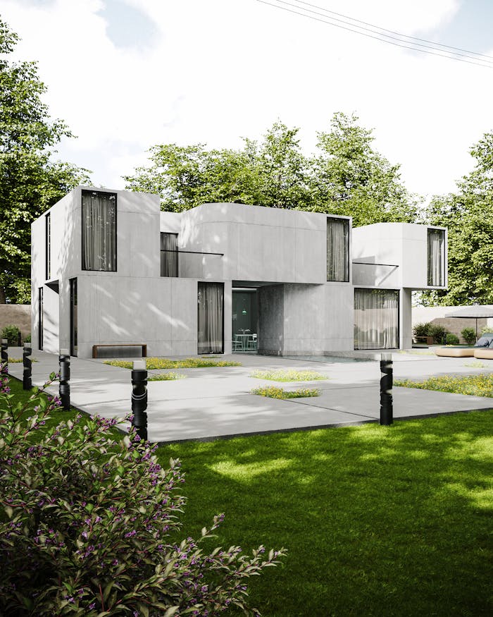 A sleek modern concrete house in a lush garden setting, showcasing minimalist architecture.